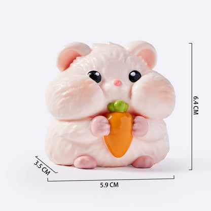Hamster Holding Carrot